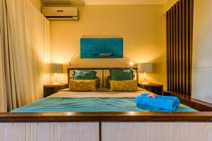Voodi või voodid majutusasutuse Esplanade by Horizon Holidays toas