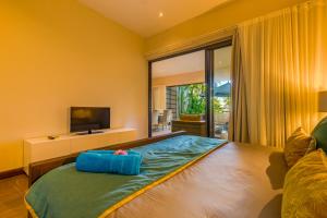 Voodi või voodid majutusasutuse Esplanade by Horizon Holidays toas