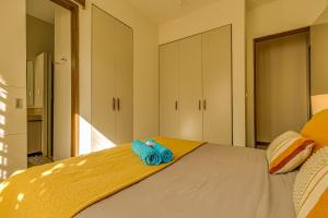 Voodi või voodid majutusasutuse Esplanade by Horizon Holidays toas