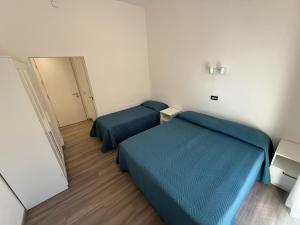 Postel nebo postele na pokoji v ubytování Hotel B&B Sole
