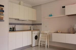 Kuchyň nebo kuchyňský kout v ubytování R3778 Bungalow Torremata
