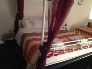 Posteľ alebo postele v izbe v ubytovaní Romeo and Juliet Apartaments