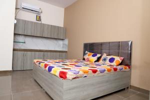 Postel nebo postele na pokoji v ubytování SIDDHAY APPARTMENTS - PG & Hostel - For Students, Faculties & Family