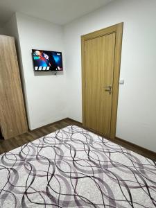 Postel nebo postele na pokoji v ubytování Apartmani Popivoda