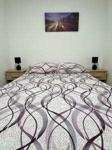 Postel nebo postele na pokoji v ubytování Apartmani Popivoda