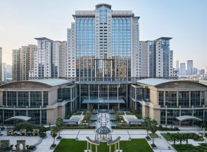a view of a large building with tall buildings at The Azure Ningbo, Vignette Collection by IHG in Ningbo