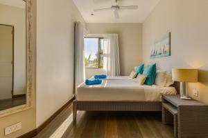 Voodi või voodid majutusasutuse Esplanade by Horizon Holidays toas