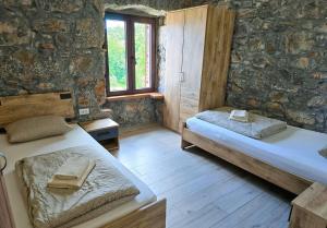 Postel nebo postele na pokoji v ubytování Casa Storia & Casa Antica + 37 fotografií