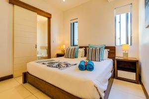 Кровать или кровати в номере Cap Ouest by Horizon Holidays