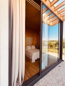 Postel nebo postele na pokoji v ubytování Rêver - Glamping and Villa