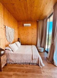 Postel nebo postele na pokoji v ubytování Rêver - Glamping and Villa