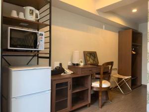 Kuchyň nebo kuchyňský kout v ubytování Le Tour Hotel Akihabara Ekimae 楽途ホテル秋葉原駅前店