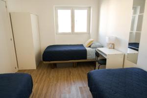 Uma cama ou camas num quarto em Casas Sao Luis