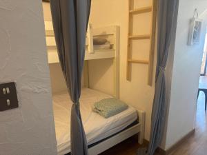 Ένα ή περισσότερα κρεβάτια σε δωμάτιο στο Appartement n 216 Moriani plage +60 φωτογραφίες
