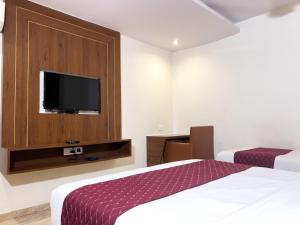 TV a/nebo společenská místnost v ubytování GATEWAY STAR HOTEL