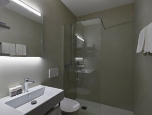 Ein Badezimmer in der Unterkunft Hotel Monte Verità