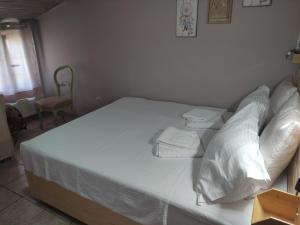 A bed or beds in a room at SamisHouse