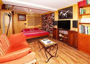 Televisyen dan/atau pusat hiburan di Apartment-Pension Im Eichenweg