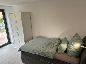 Postel nebo postele na pokoji v ubytování MainSpessartBlick