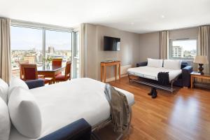 Ένα ή περισσότερα κρεβάτια σε δωμάτιο στο Marlin Aldgate Tower Bridge