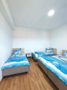 Katil atau katil-katil dalam bilik di Apartments Sea Sky View