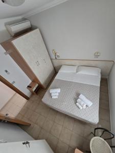 Postel nebo postele na pokoji v ubytování Hotel Gioiella