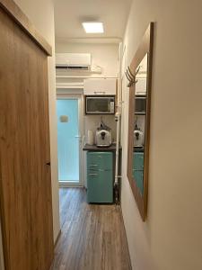 Kuchyň nebo kuchyňský kout v ubytování Szeri Szállás Szeged