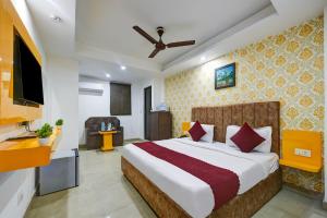 Postel nebo postele na pokoji v ubytování Hotel Happy Stay Delhi Airport