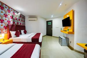 Postel nebo postele na pokoji v ubytování Hotel Happy Stay Delhi Airport