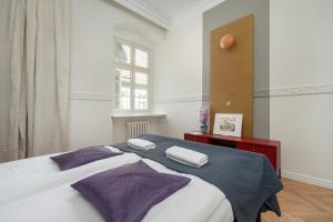 Posteľ alebo postele v izbe v ubytovaní Exclusive Old Town Apartment by Noclegi Renters