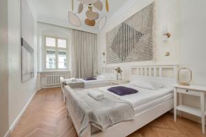 Posteľ alebo postele v izbe v ubytovaní Exclusive Old Town Apartment by Noclegi Renters