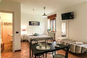 TV a/nebo společenská místnost v ubytování InGarda Rooms