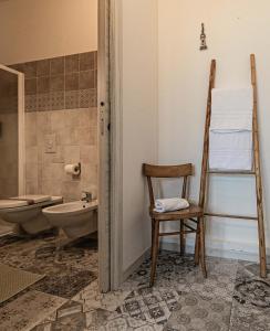 Koupelna v ubytování InGarda Rooms + 37 fotografií