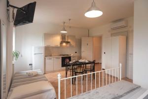 Kuchyň nebo kuchyňský kout v ubytování InGarda Rooms