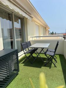 Patio nebo venkovní prostory v ubytování Super T2 Rénové Aperçu Mer Toutes Commodités