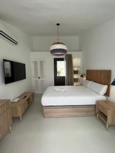 Postel nebo postele na pokoji v ubytování Estepona - Playa - Villa situada muy cerca del mar