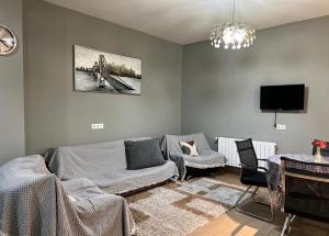 Μια τηλεόραση ή/και κέντρο ψυχαγωγίας στο City Center Comfortable Room