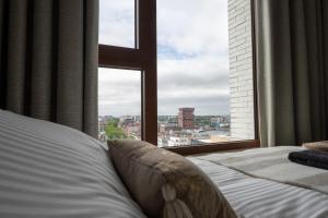 Postel nebo postele na pokoji v ubytování Sunset Penthouse Antwerp