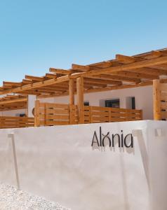 a sign in front of a building at Alonia Suites in Naousa