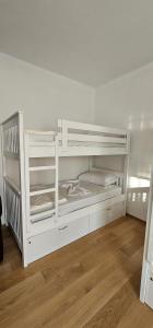 Postel nebo postele na pokoji v ubytování i hostel