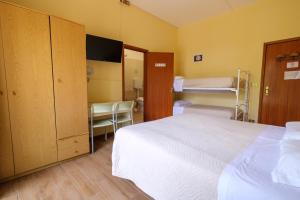 Postel nebo postele na pokoji v ubytování Only Room Hotel