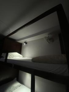 Postel nebo postele na pokoji v ubytování New Frezon hostel