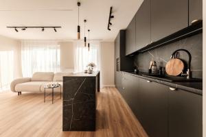 Kuchyň nebo kuchyňský kout v ubytování Apartamenty Garbarska