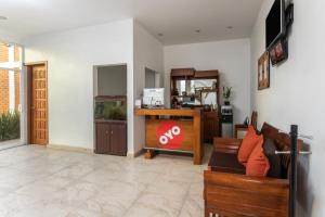 TV a/nebo společenská místnost v ubytování Capital O Hotel Emperadores Inn, Atlixco