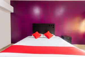 Postel nebo postele na pokoji v ubytování Capital O Hotel Emperadores Inn, Atlixco