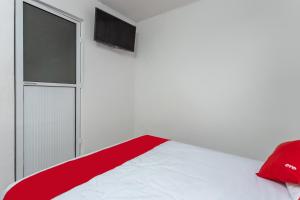 Postel nebo postele na pokoji v ubytování Capital O Hotel Emperadores Inn, Atlixco