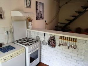 Kuchyňa alebo kuchynka v ubytovaní Holiday home in Gyenesdias - Balaton 43113