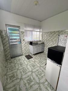Kuchyň nebo kuchyňský kout v ubytování Quarto Duplo Confort