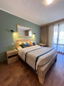 Ліжко або ліжка в номері Ghazala Beach