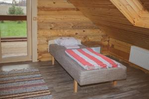 Postel nebo postele na pokoji v ubytování Järve Holiday Village